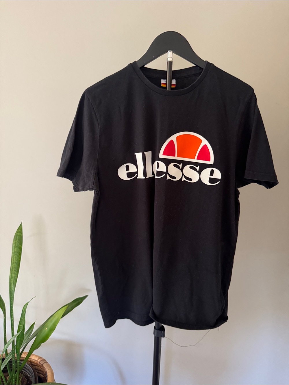 Ellesse Black Tee with White Text and Red-Orange Logo
